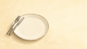 空の皿とカトラリーを描いた断食記事のイラスト